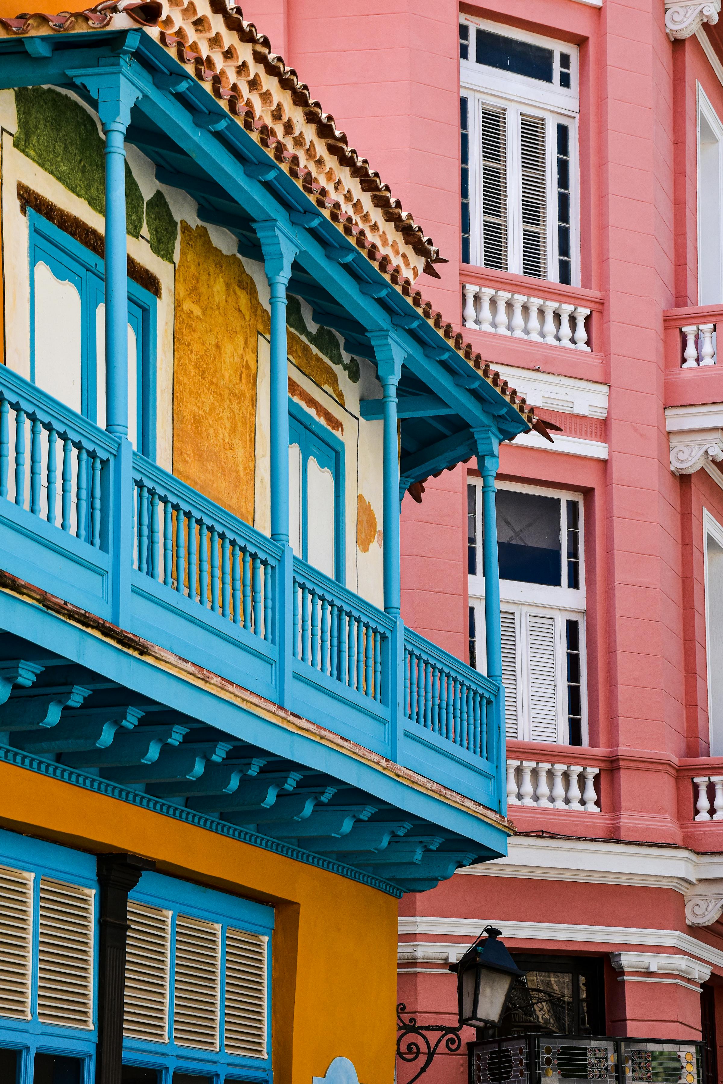 Colourful colonial buildings lining a vibrant street in Havana, Cuba