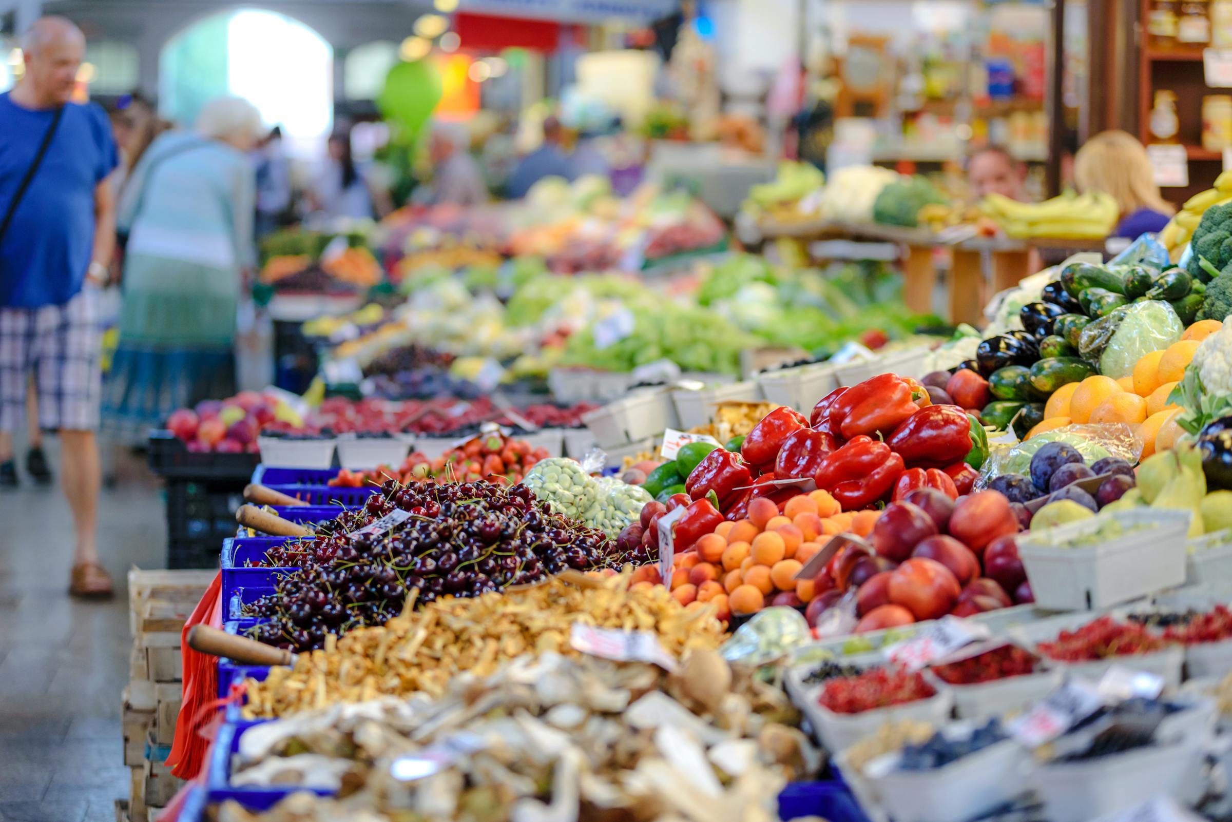 Colourful fresh vegetables at an open-air tropical market stall